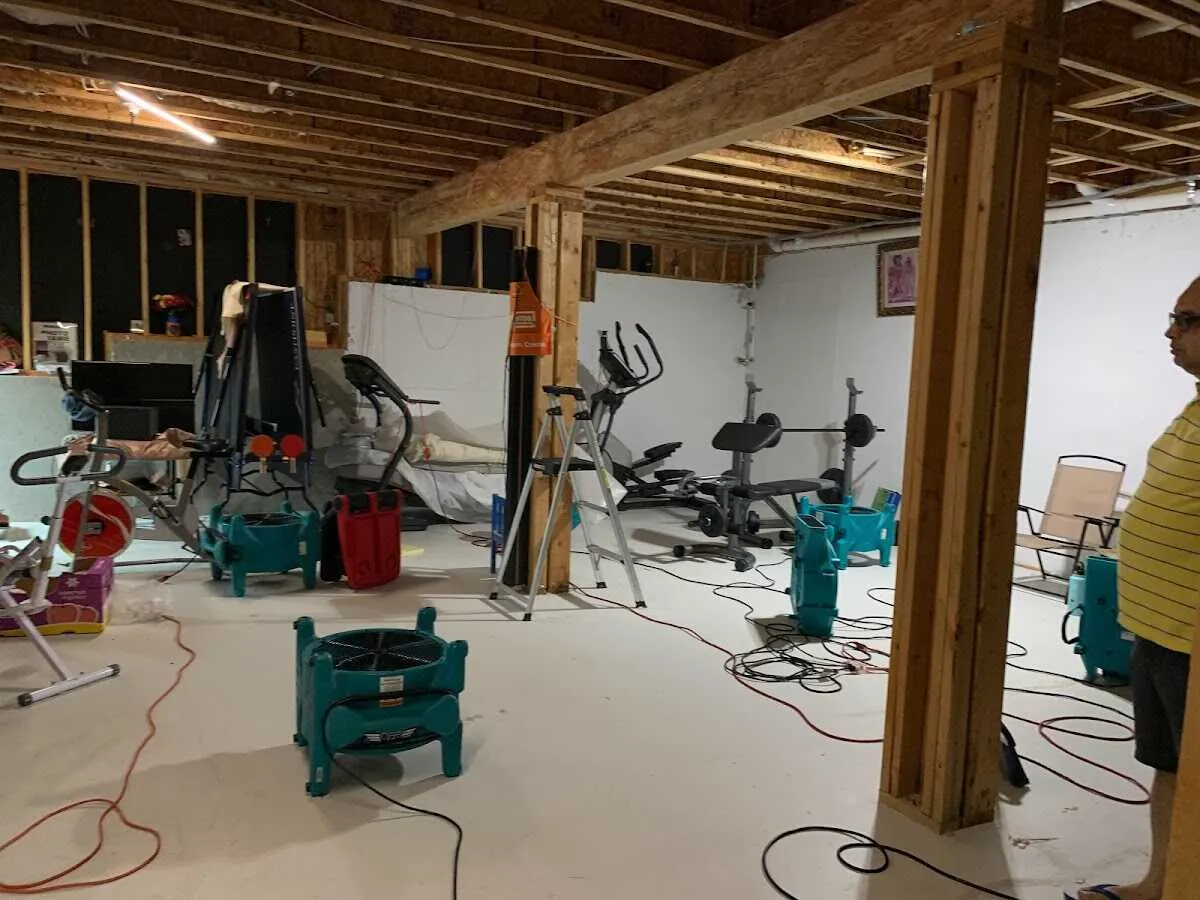 Basement drying equipment setup for Contents Cleaning & Restoration in Stonington